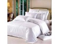 quality-white-duvets-and-bedsheets-small-0